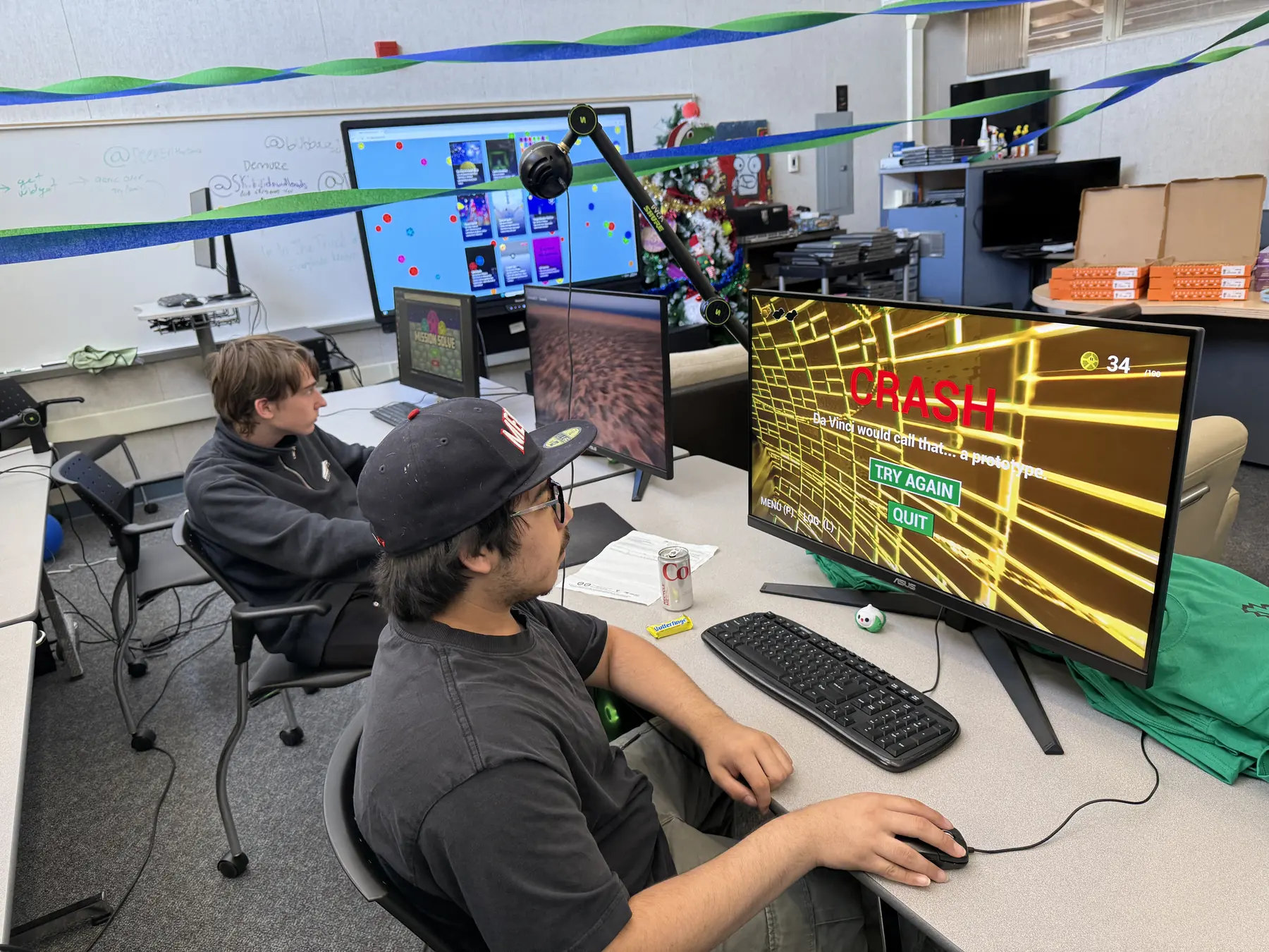 A student testing a club game at one of the lab PCs
